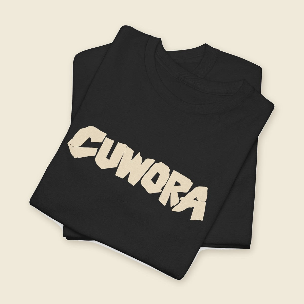 CUWORA Wordmark Tee product render: CUWORA wordmark printed large across the chest, plain back