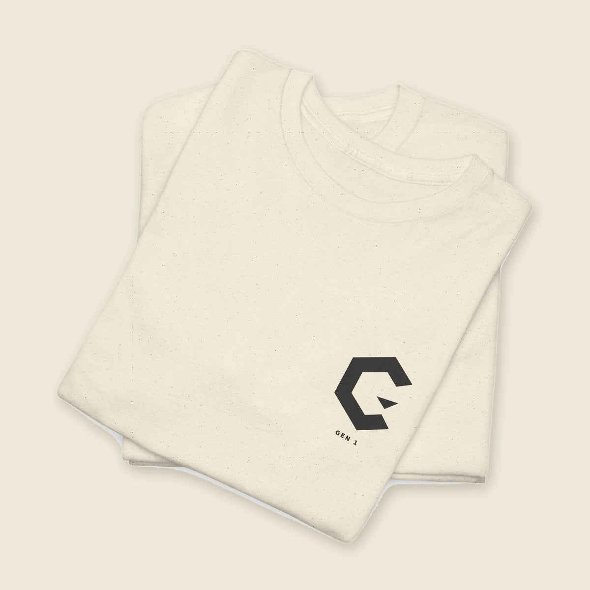 Seated Signal Tee product render: natural tee, back print of a seated figure in black ink against a dusty blue panel, C mark on the left chest