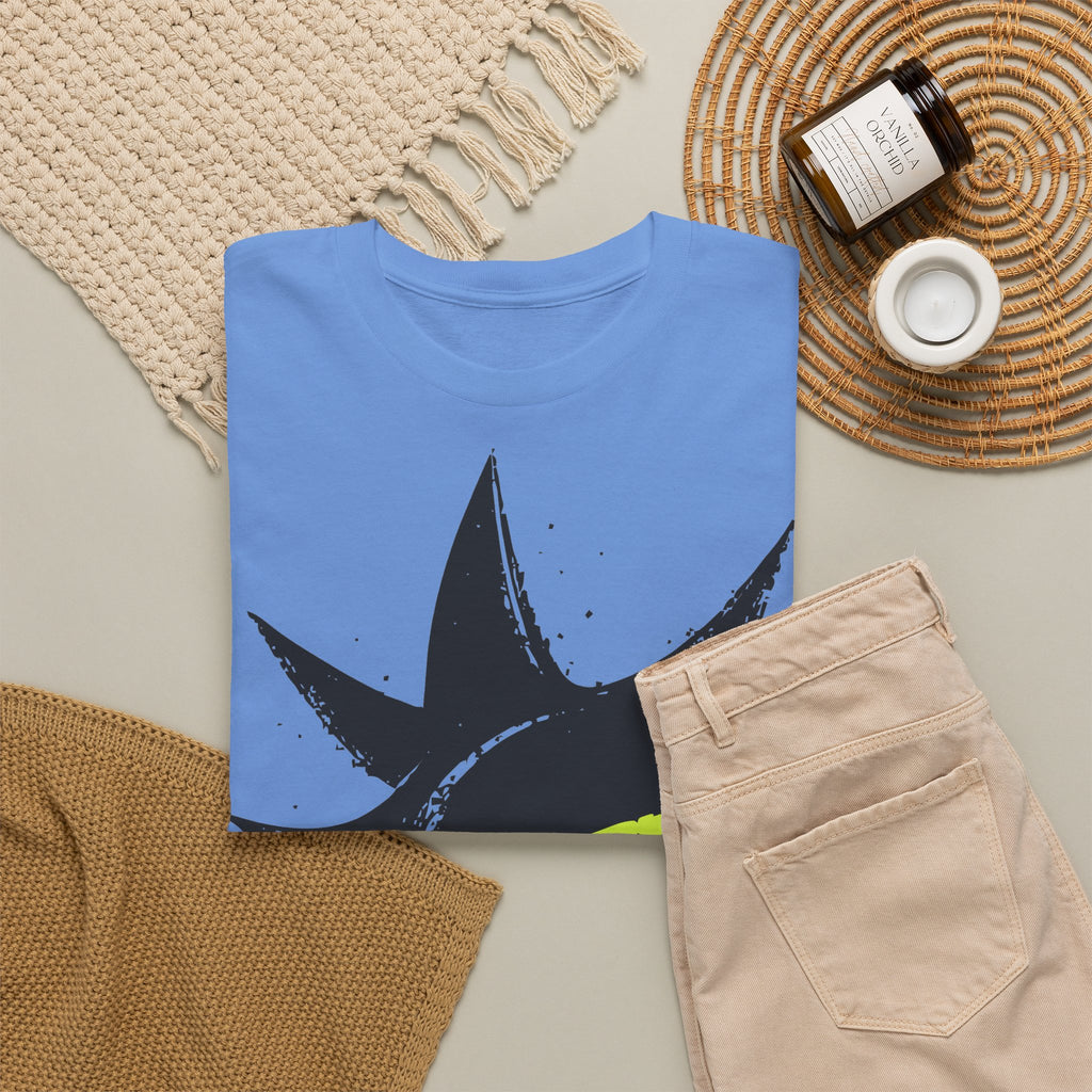 Signal Eye Tee in Carolina Blue, flat lay with jeans