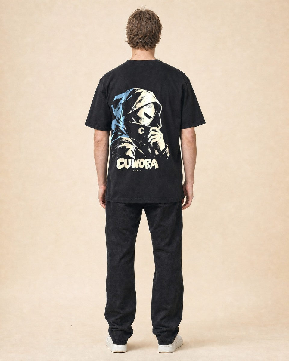 Model wearing the Hooded Portrait Tee in Black, back view with the hooded portrait print in bone and dusty blue