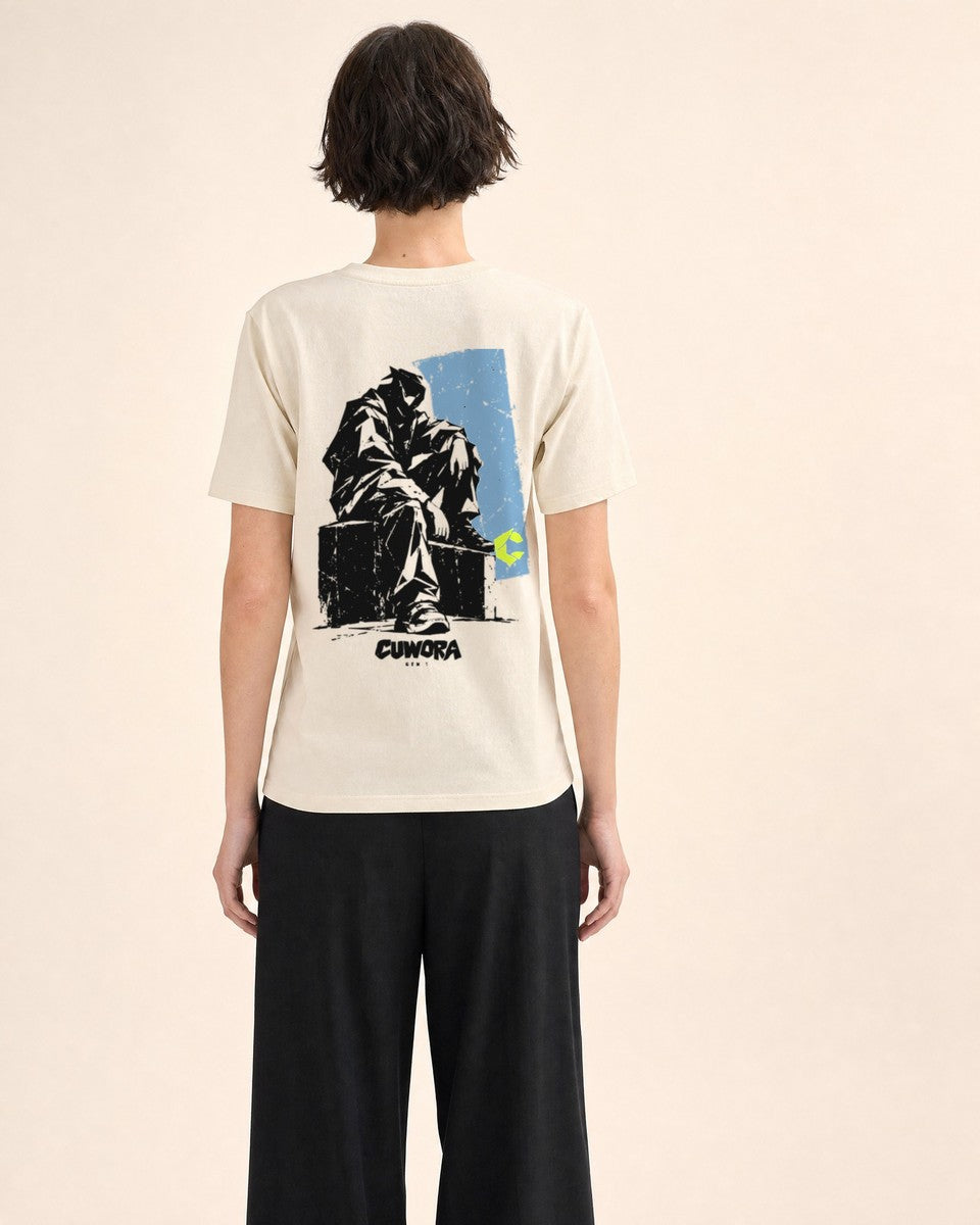 Model wearing the Seated Signal Tee in Natural, back view with the seated figure print across the back
